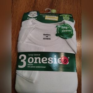Gerber white long sleeve onesies sz 24 months. 3 pack